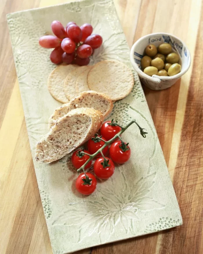 impressed platter green seeds bread rectangle